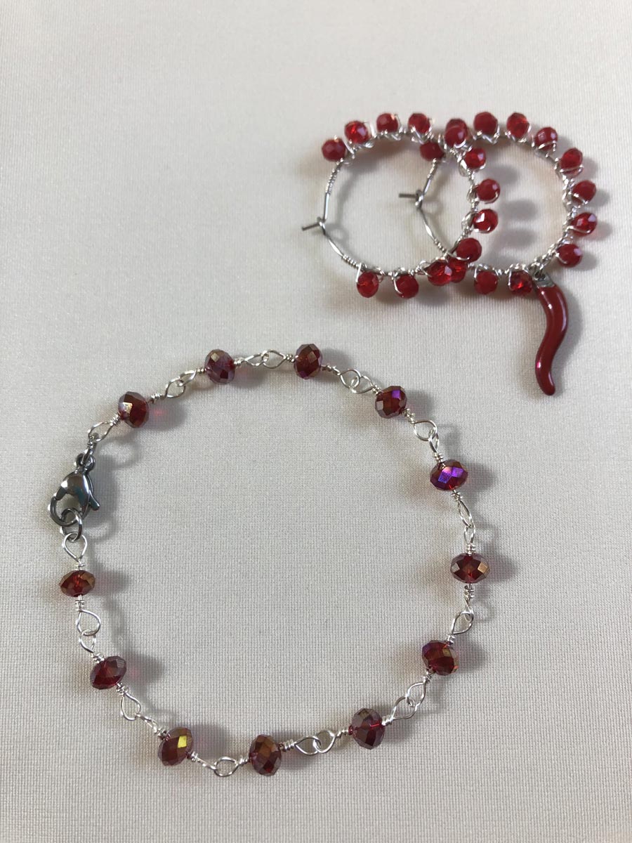 Braccialetto e orecchini perle rosse